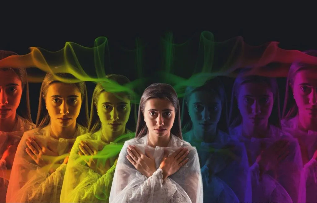 Woman showing a mix of rare aura colors